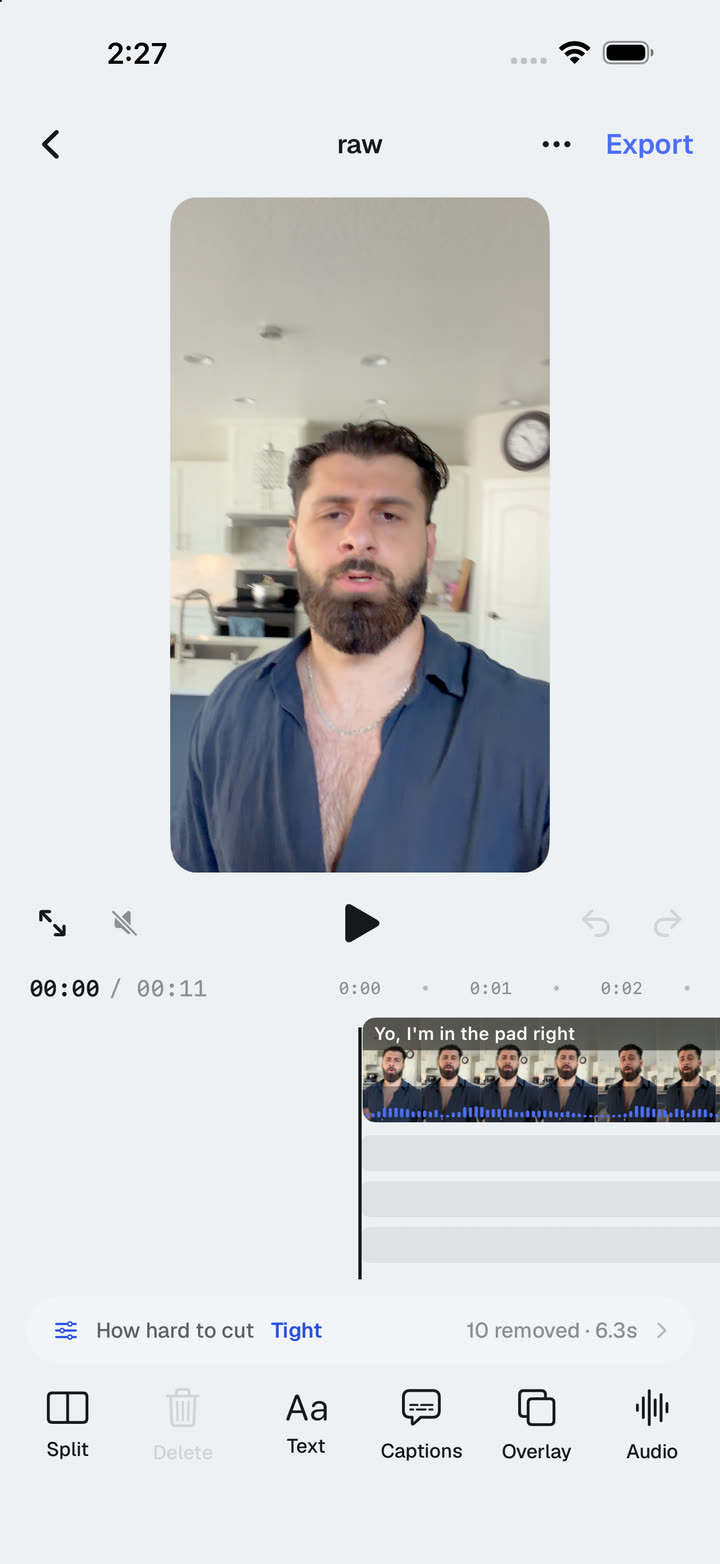 The editor: a timeline of kept clips with captions, text and audio tools